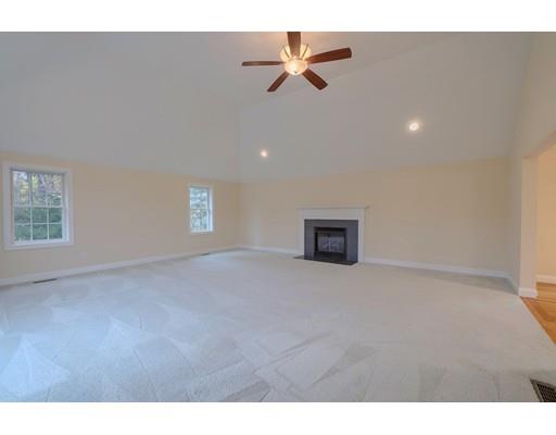 24 Regency Drive Dracut, MA 01826 - Photo 17 of 42 a view of an empty room with a window