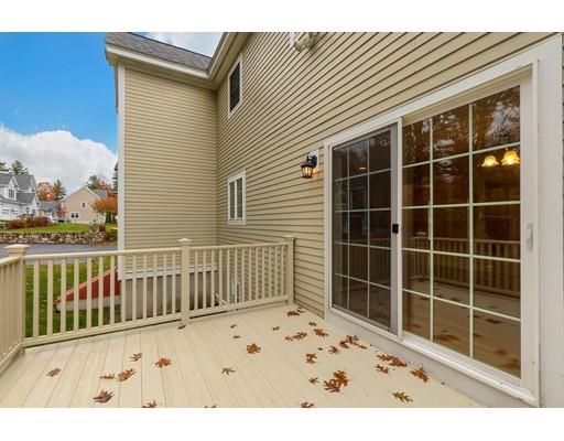 24 Regency Drive Dracut, MA 01826 - Photo 6 of 42 a view of a house with a window