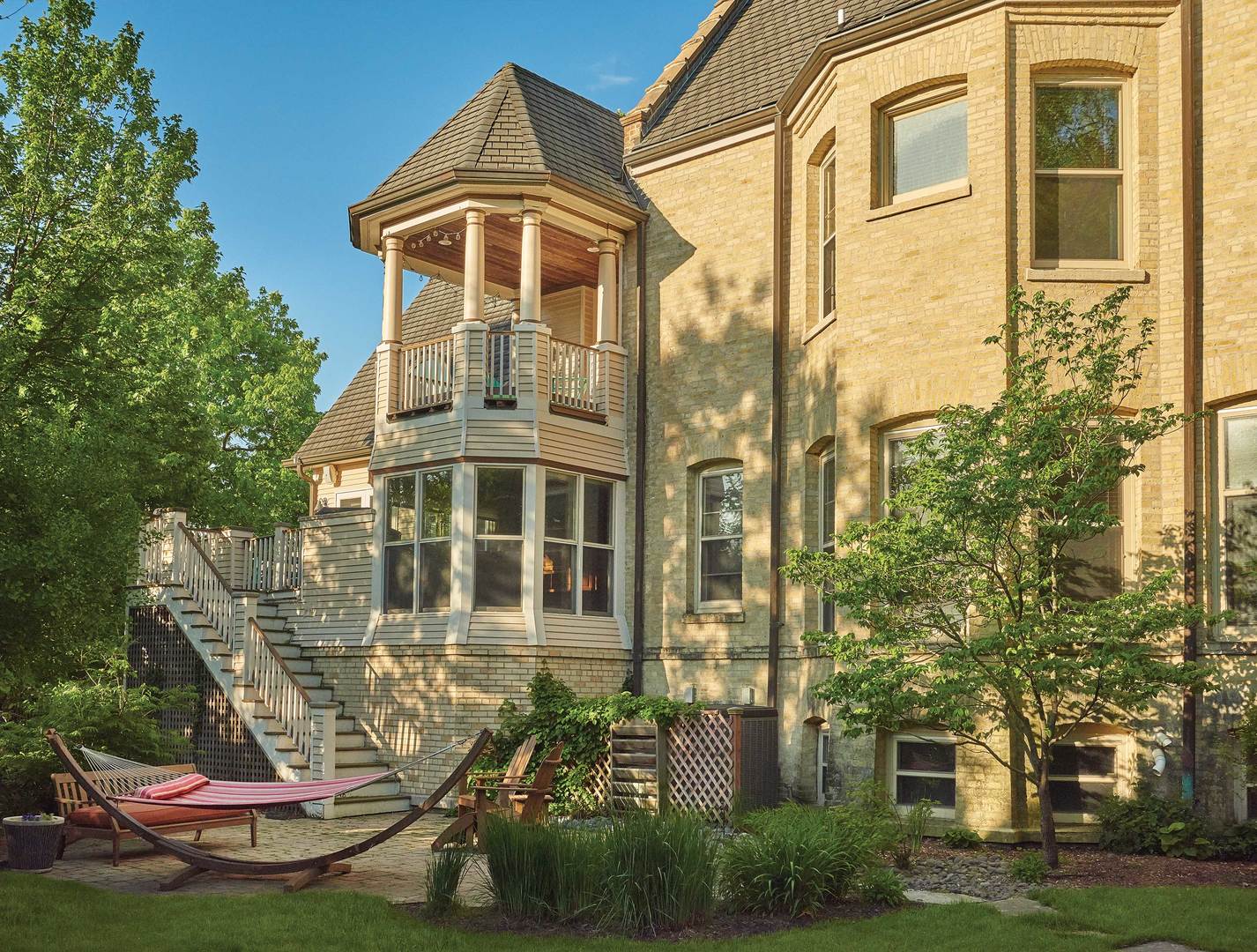 76 Logan Loop Highland Park, IL 60035 - Photo 13 of 17 a front view of a house with a yard