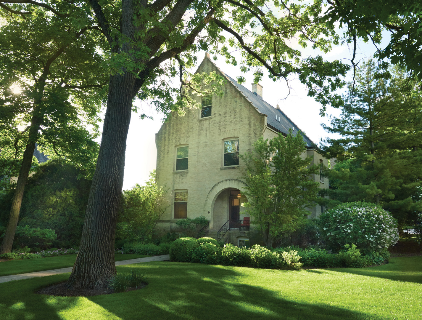 76 Logan Loop Highland Park, IL 60035 - Photo 17 of 17 a front view of a house with garden