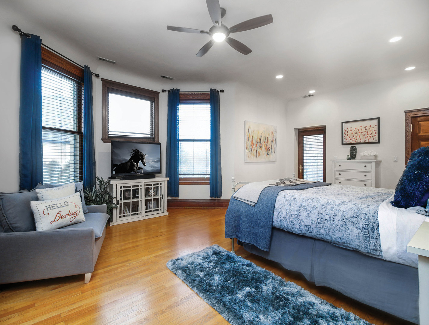 76 Logan Loop Highland Park, IL 60035 - Photo 10 of 17 a bedroom with a bed wooden floor and window