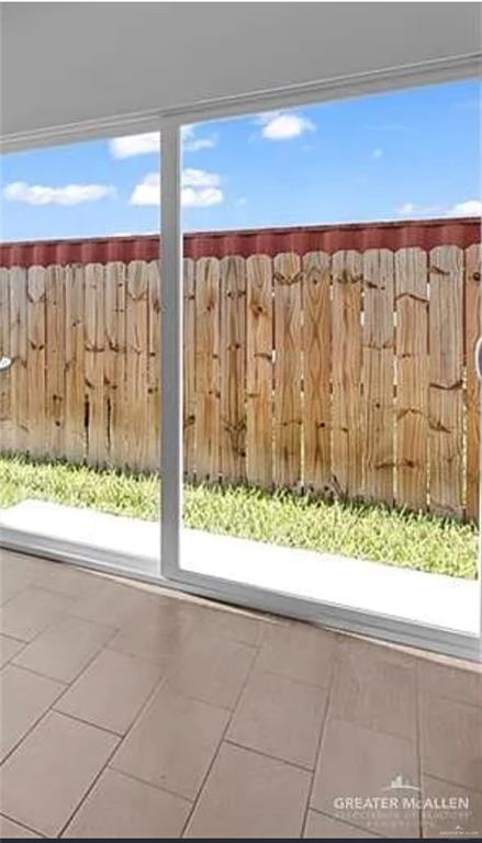 1403 Marcela Drive, Unit 3 Weslaco, TX 78599 - Photo 7 of 13 View of yard featuring a patio area