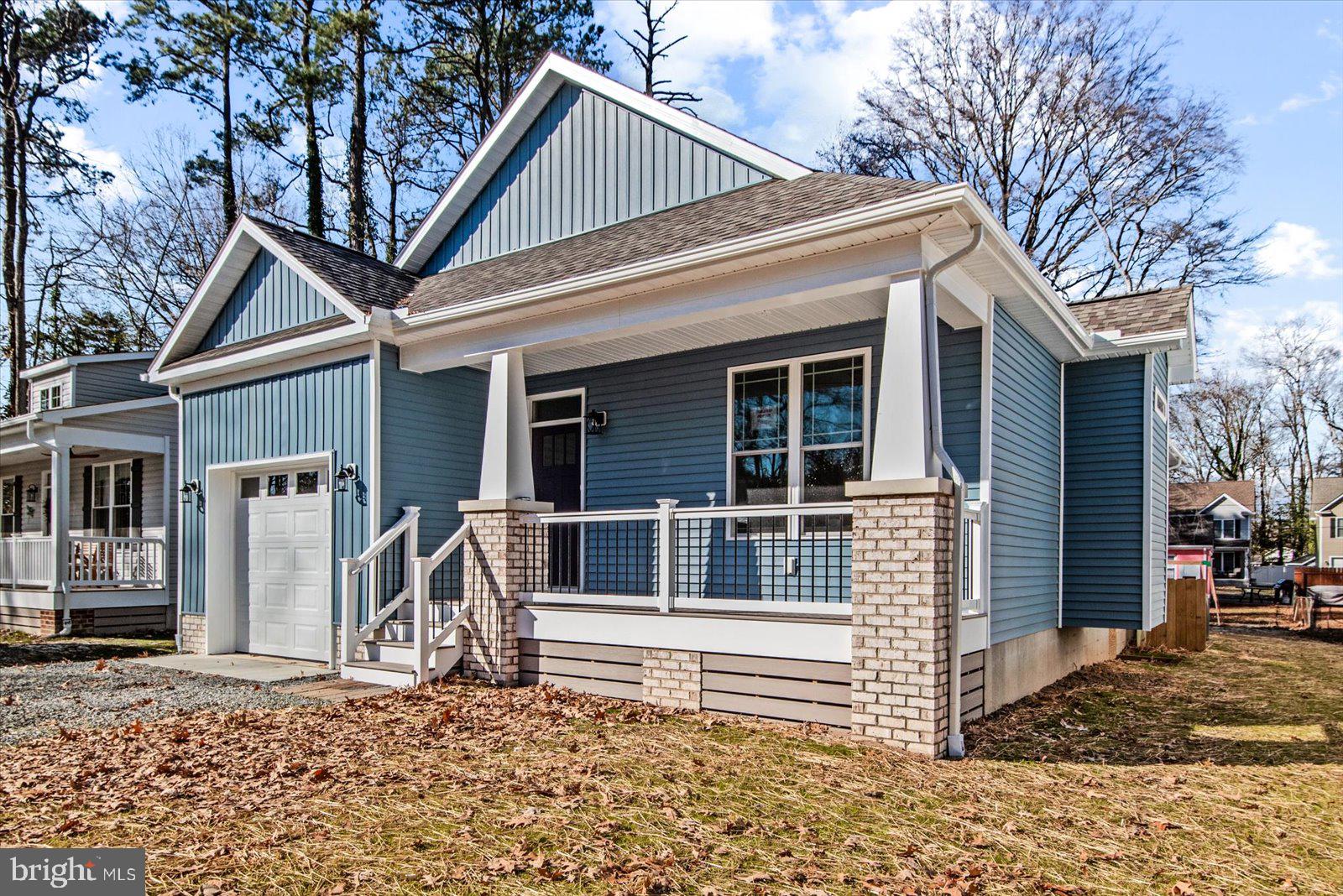a house with trees in the background