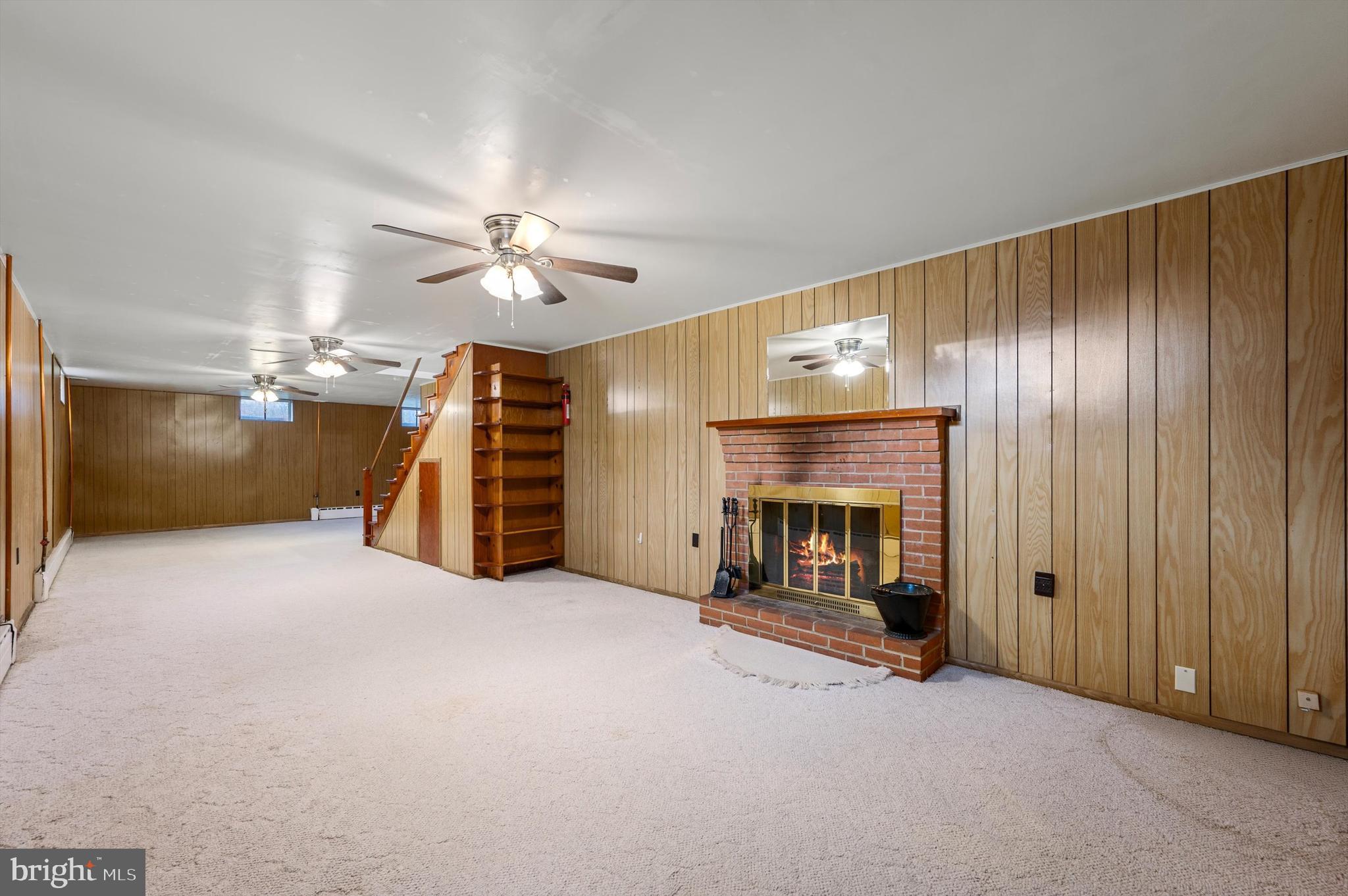 312 Bryarly Road Winchester, VA 22603 - Photo 27 of 47 Finished Basement with wood burning Fireplace