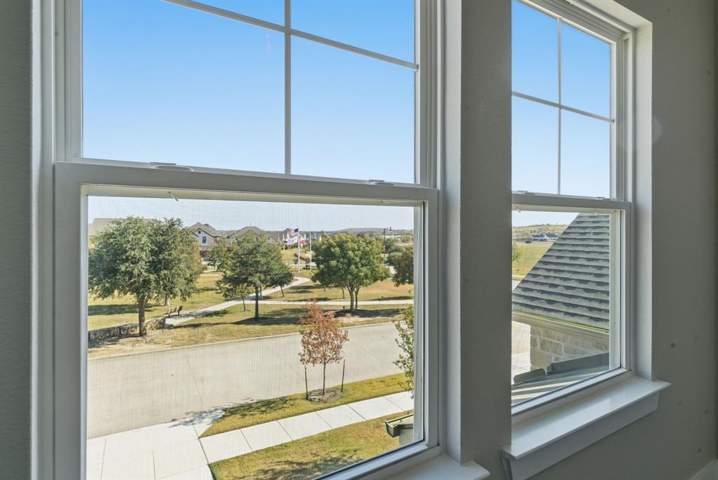 13705 Green Hook Road Fort Worth, TX 76008 - Photo 32 of 40 a view of a glass door with a from a window