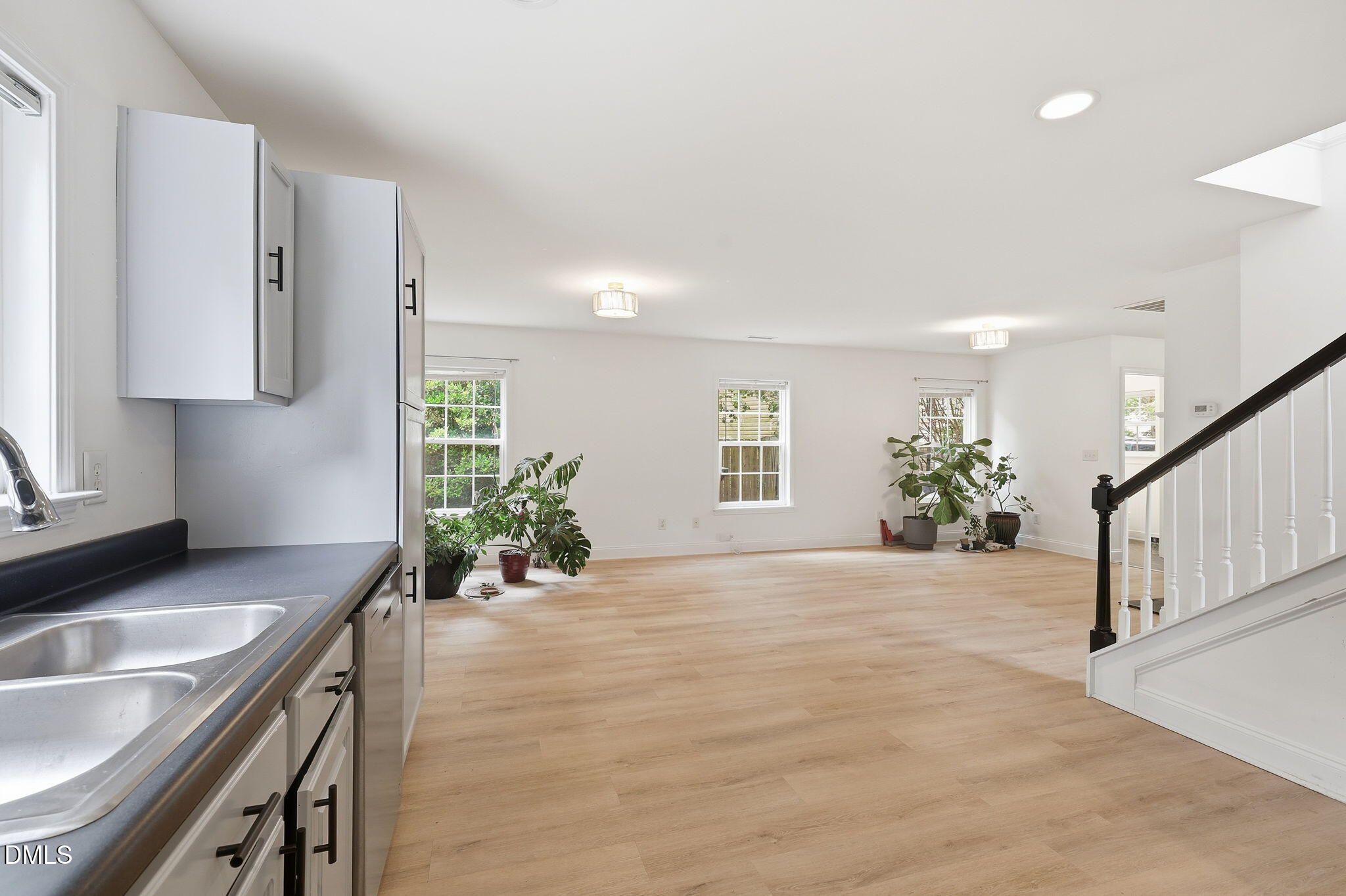 197 Depot Ridge Road Garner, NC 27529 - Photo 17 of 35 29 Kitchen, stairs, and half bathroom
