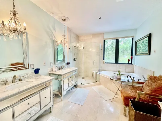 a bath tub sitting next to a window