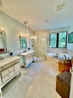 a view of a balcony with furniture