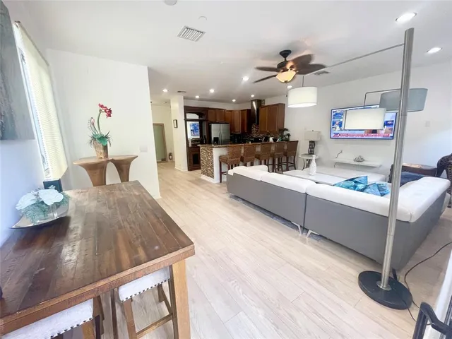 a spacious bathroom with sinks mirror and a bathtub