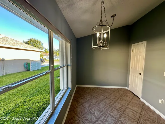 a view of a livingroom with furniture