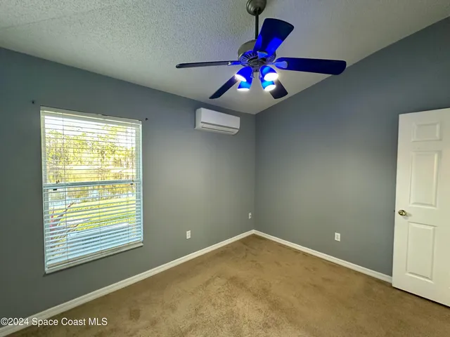 a view of an empty room with window
