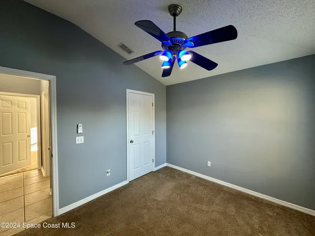 en view of an empty room with a window