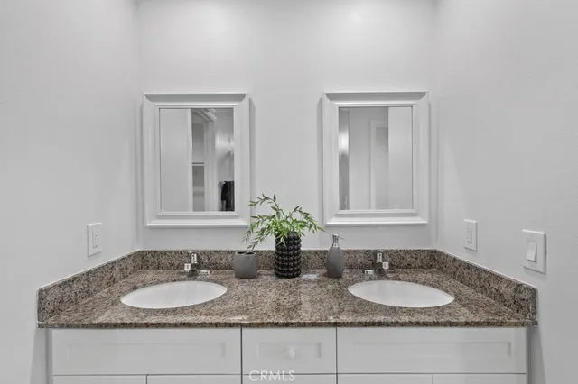 a bedroom with a bed and a walk in closet