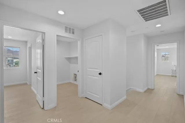 a view of a backyard with a table and chairs