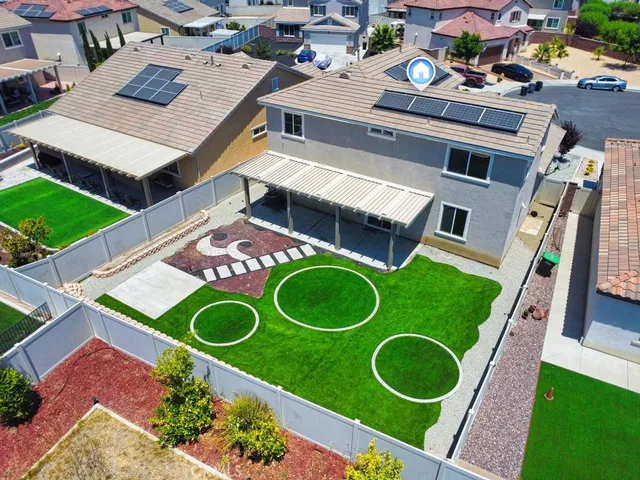 an aerial view of a kitchen tables and chairs