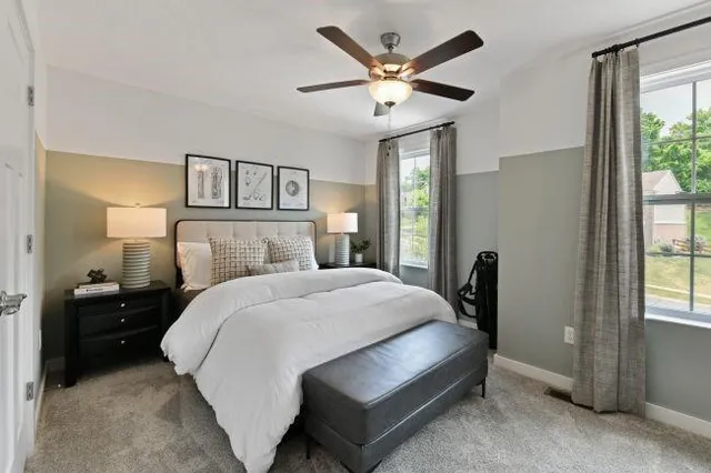 a bathroom with a sink vanity and shower