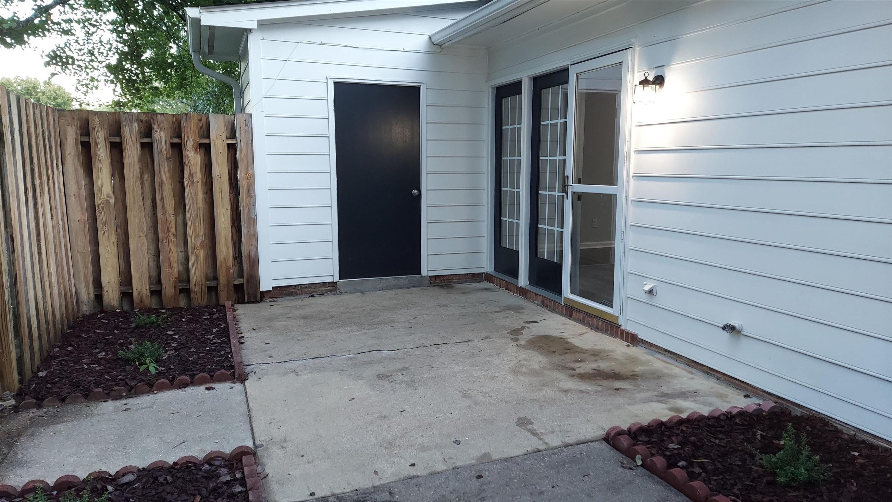 6813 Fairpoint Court Raleigh, NC 27613 - Photo 11 of 12 Enclosed Patio Area