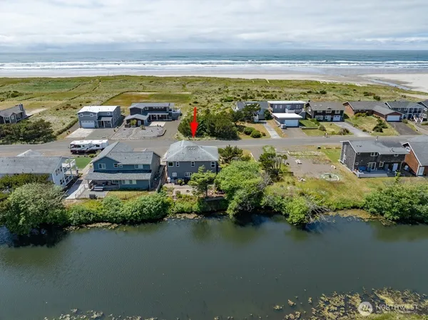 a view of a city with an ocean