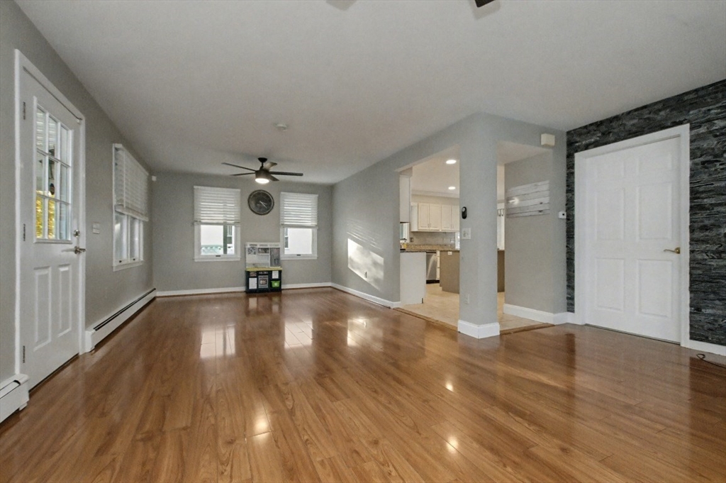 48 Cordis Street Wakefield, MA 01880 - Photo 13 of 35 a view of empty room with wooden floor and a window