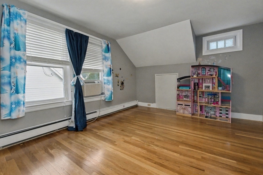 48 Cordis Street Wakefield, MA 01880 - Photo 21 of 35 a view of a livingroom with furniture and window