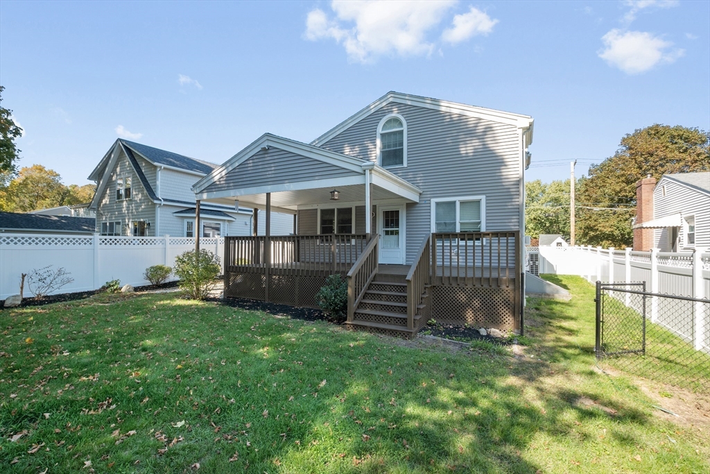 48 Cordis Street Wakefield, MA 01880 - Photo 22 of 35 a front view of a house with a yard