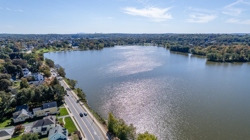 48 Cordis Street Wakefield, MA 01880 - Photo 26 of 35 a view of a lake with a city