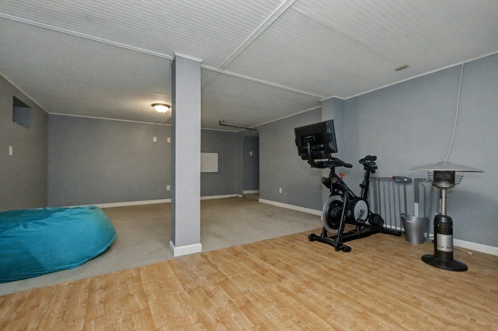 48 Cordis Street Wakefield, MA 01880 - Photo 32 of 35 a view of a room with gym equipment