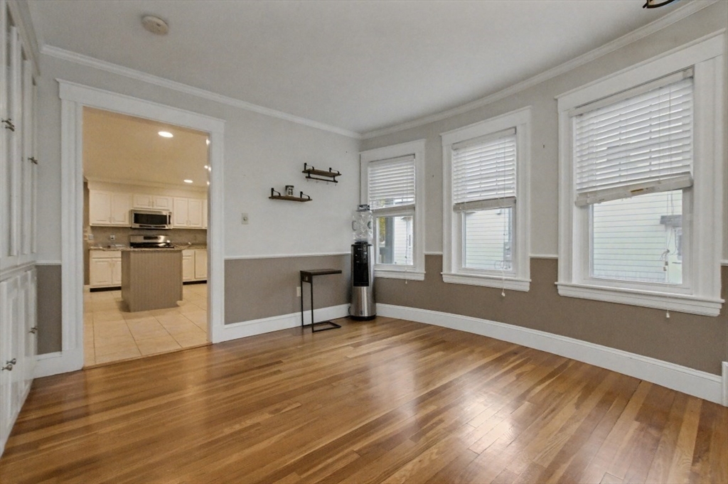 48 Cordis Street Wakefield, MA 01880 - Photo 8 of 35 a view of a kitchen with furniture and windows