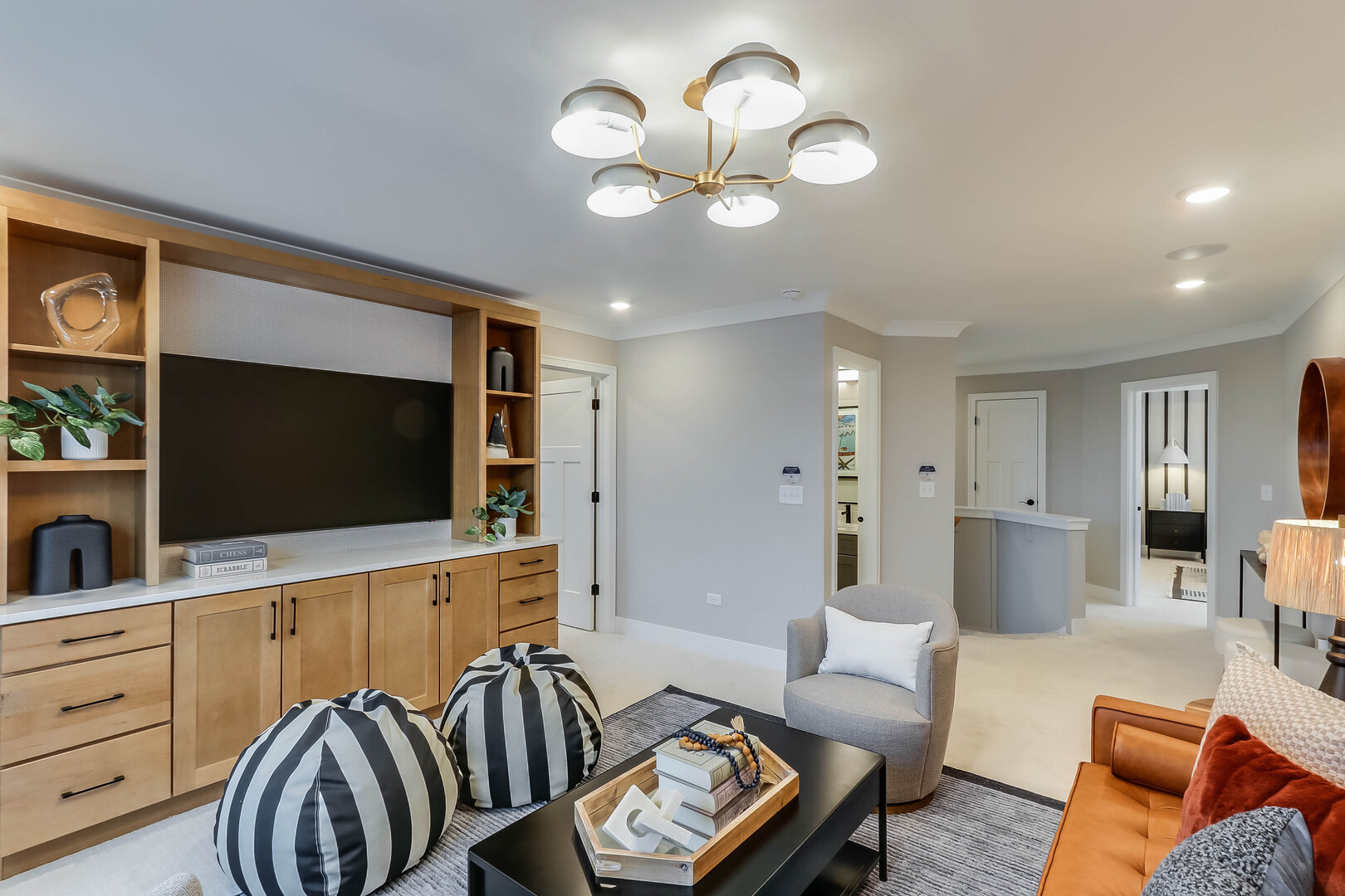 10772 Chadsey Road Huntley, IL 60142 - Photo 20 of 29 a living room with furniture and a flat screen tv