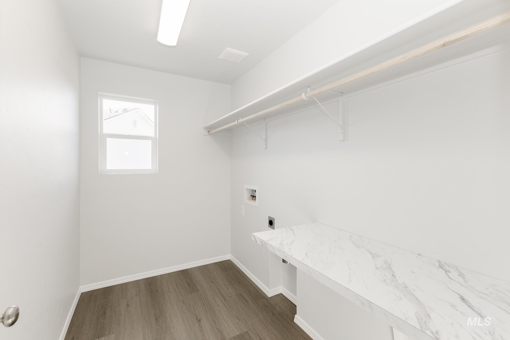 3070 South Maple Rnch Way Nampa, ID 83686 - Photo 25 of 33 Laundry room with washer hookup, dark wood-style floors, and hookup for an electric dryer