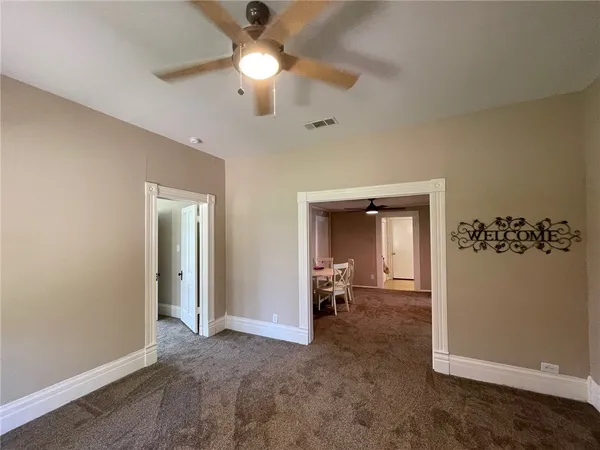 a bathroom with a double vanity sink and mirror