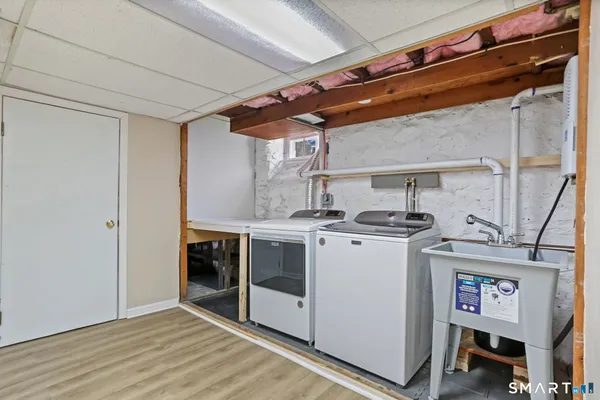 a utility room with washer and dryer