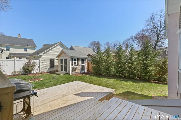 a front view of a house with yard