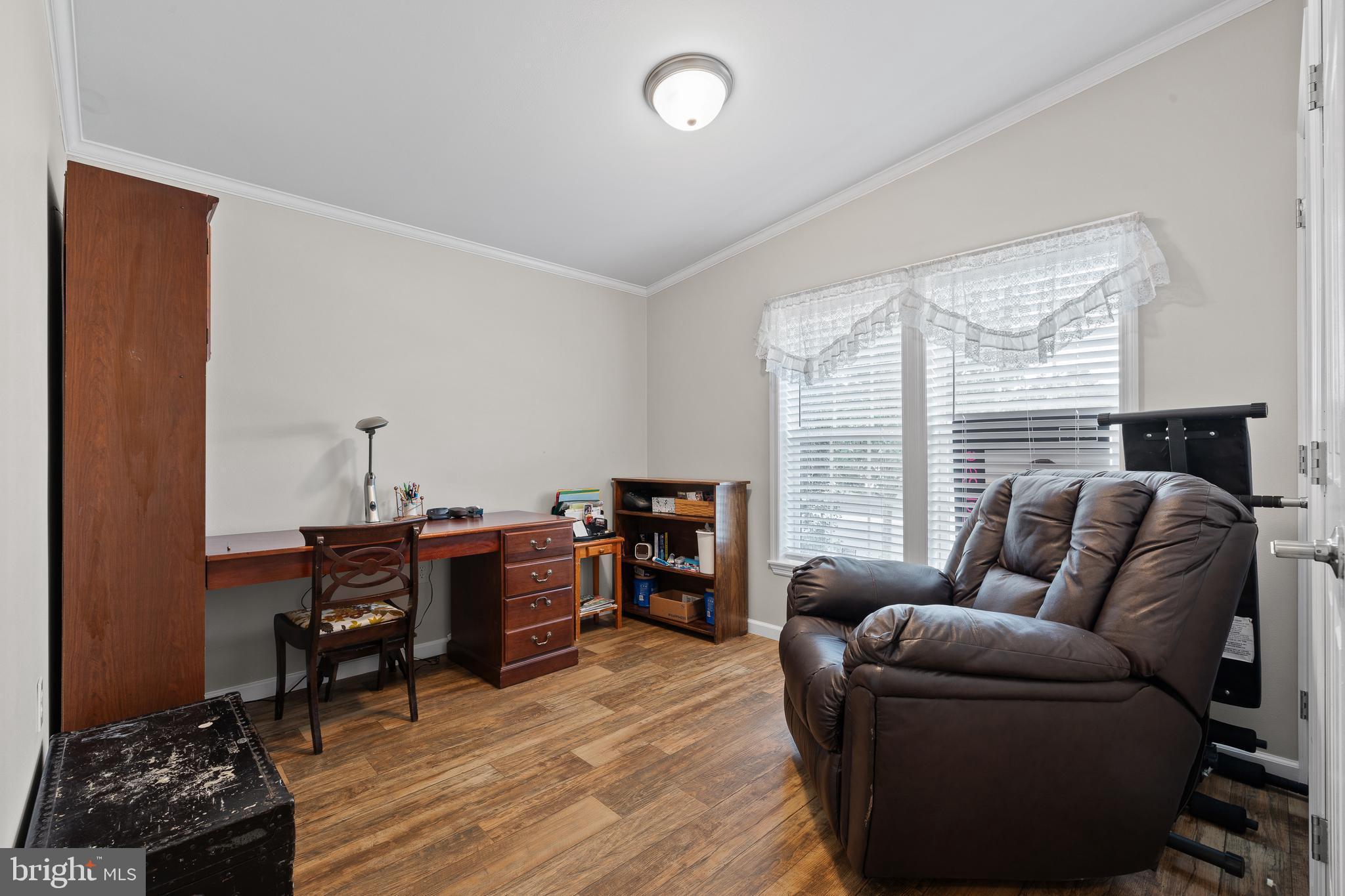 74 Middlemarch Road Douglassville, PA 19518 - Photo 7 of 26 a living room with furniture and a flat screen tv