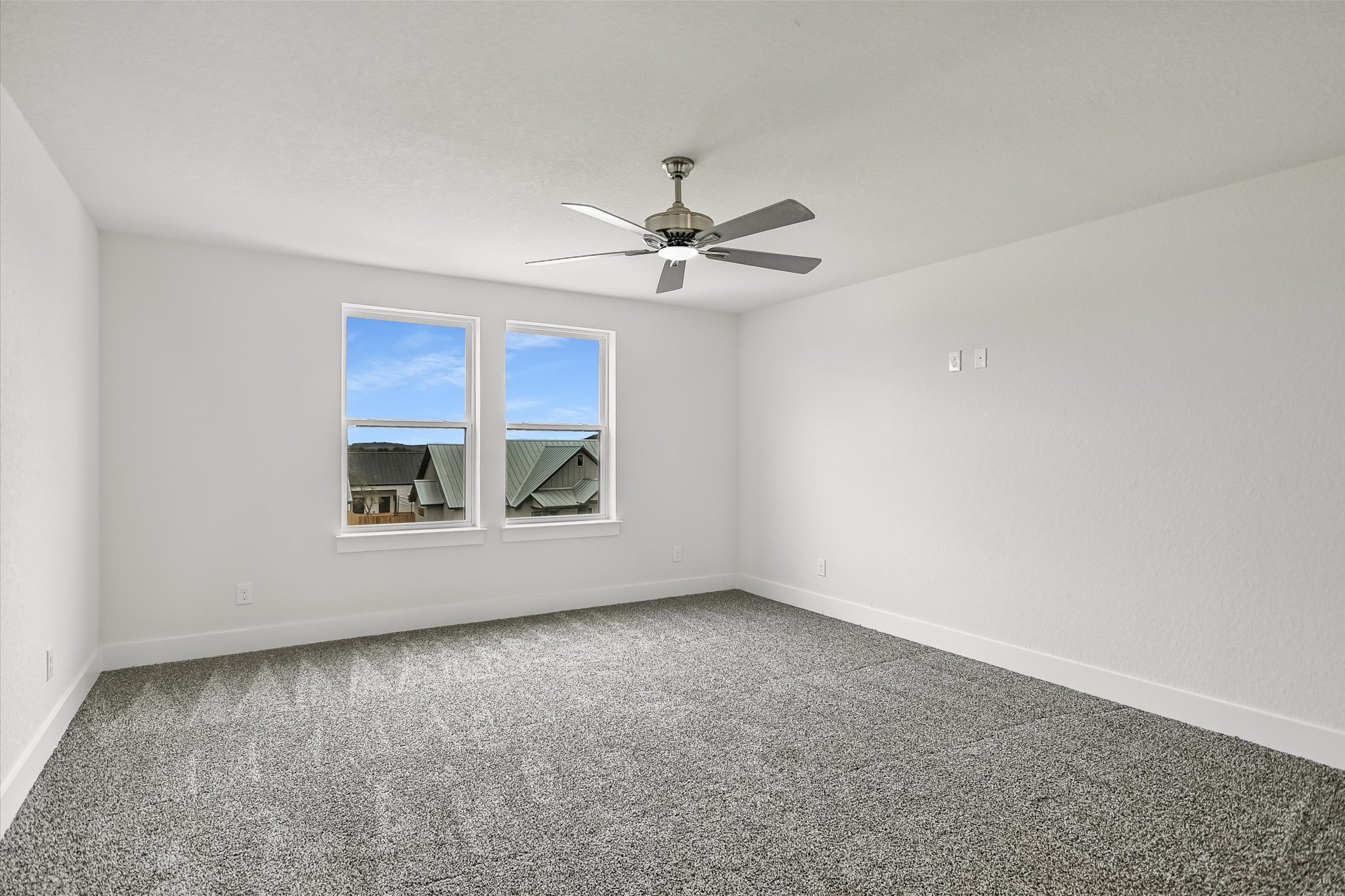 32 Peace Pipe Wimberley, TX 78676 - Photo 11 of 20 Empty room with carpet floors and a ceiling fan