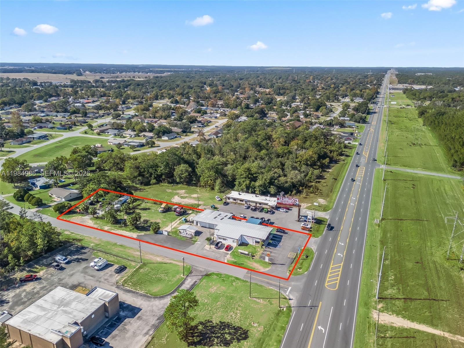 9594 Southeast Maricamp Road Ocala, FL 34472 - Photo 9 of 45 an aerial view of a city