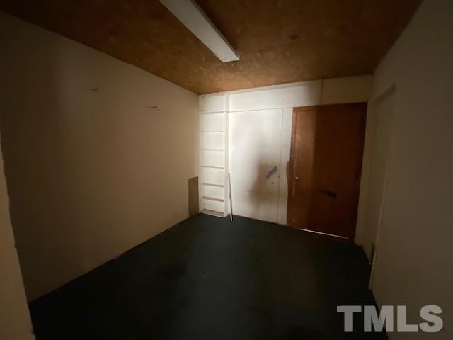 107 North 12th Street Erwin, NC 28339 - Photo 19 of 23 an empty room with wooden floor