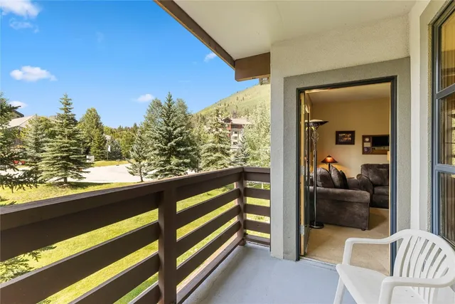 a view of balcony with furniture
