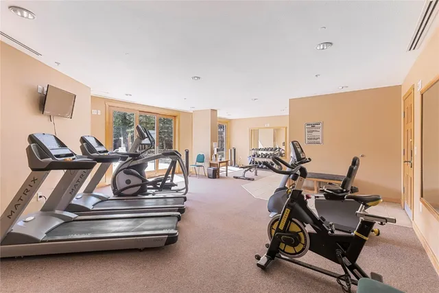 a view of a room with gym equipment