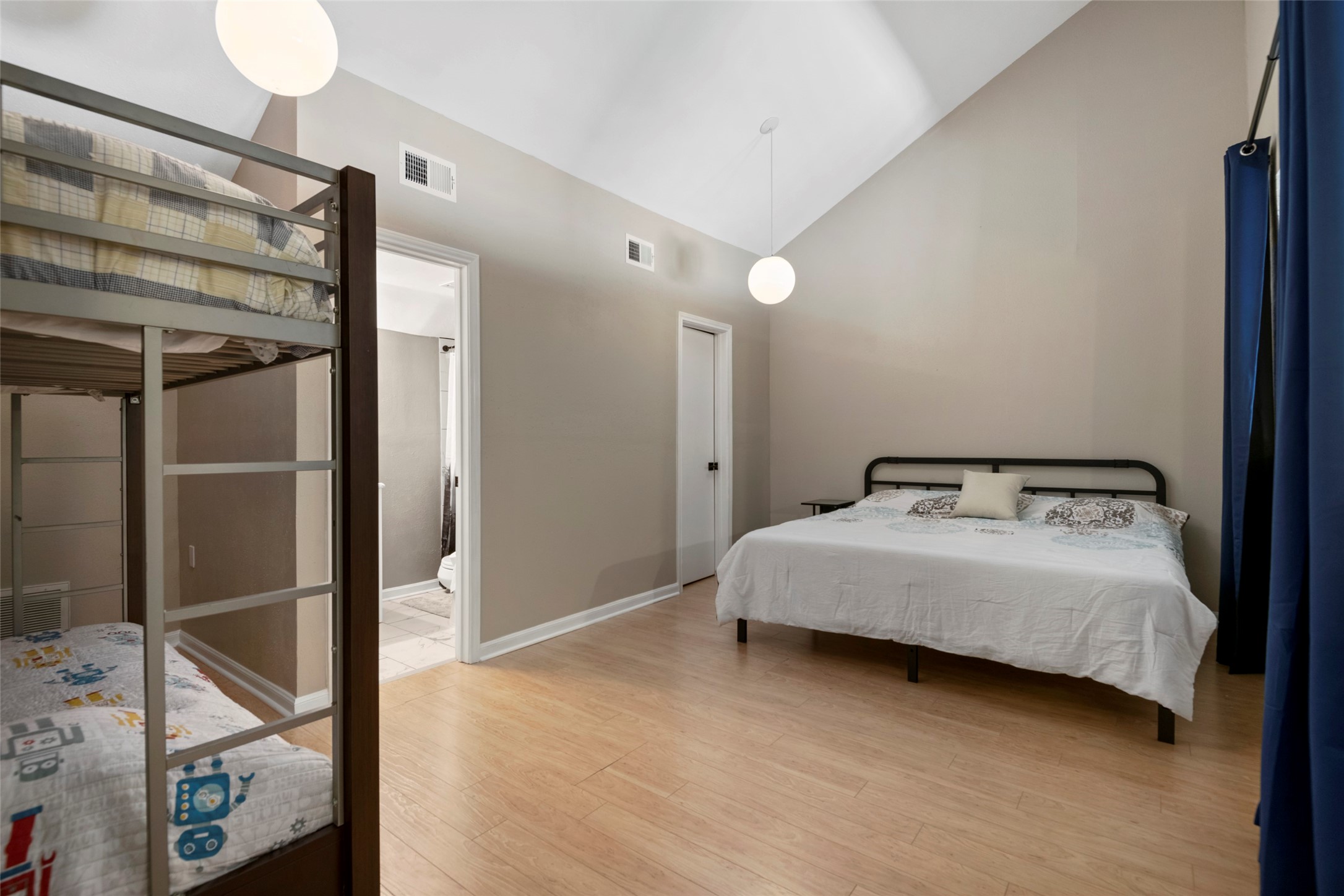 162 April Point Drive South Conroe, TX 77356 - Photo 14 of 26 a bedroom with a bed and a mirror
