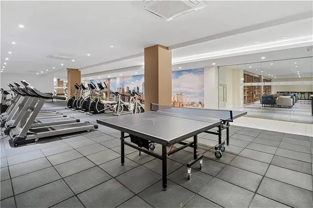 a kitchen with a table and chairs in it