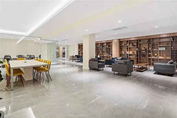 a kitchen with a table and chairs in it