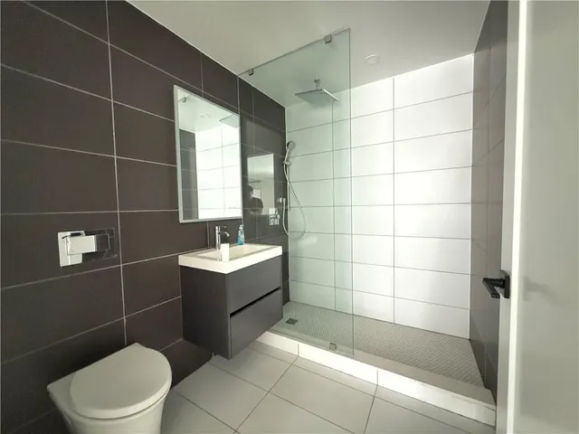 a bathroom with a bathtub sink and toilet