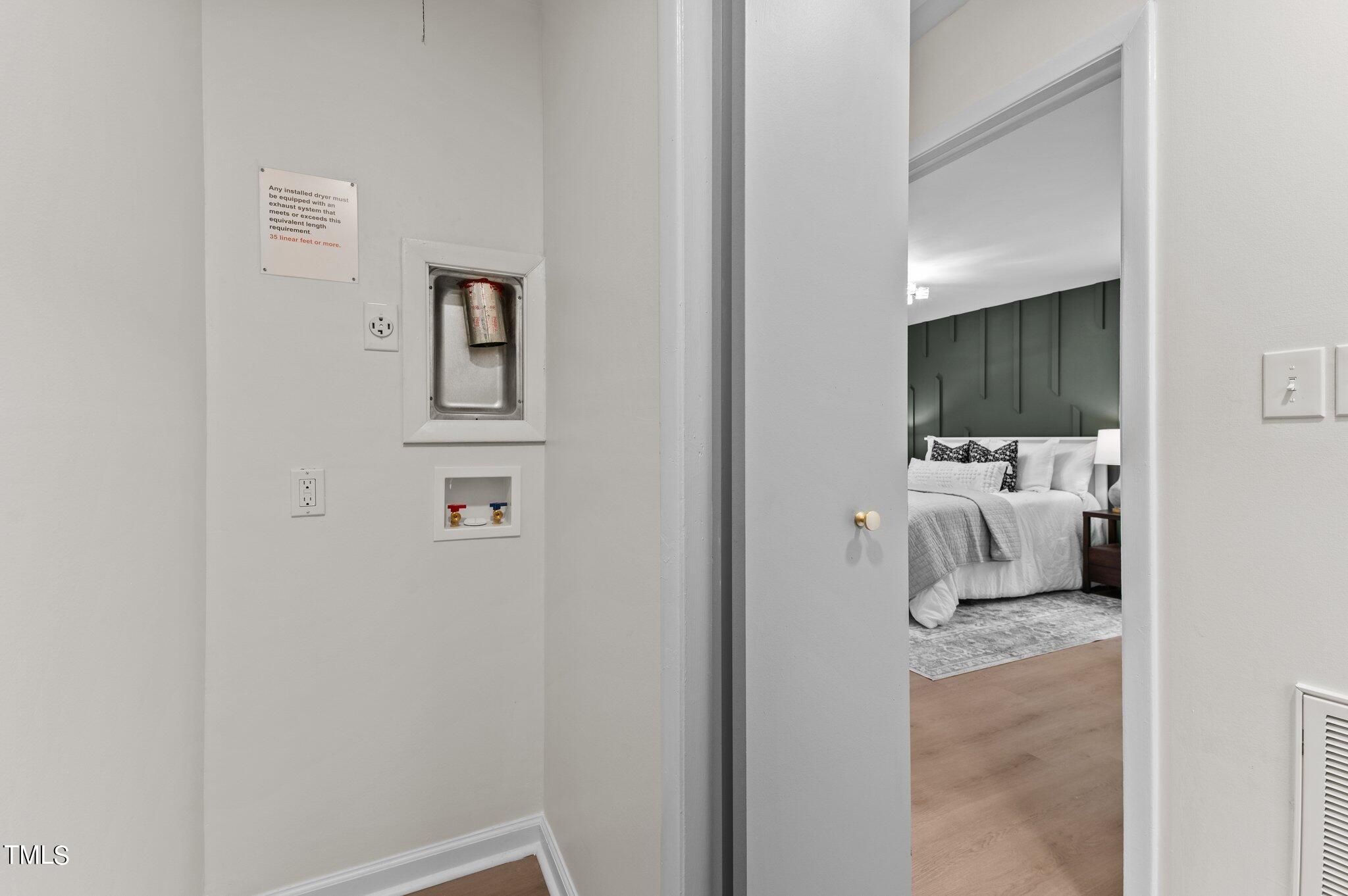 405 Roxanne Drive Raleigh, NC 27603 - Photo 28 of 48 a bedroom with a bed and couch