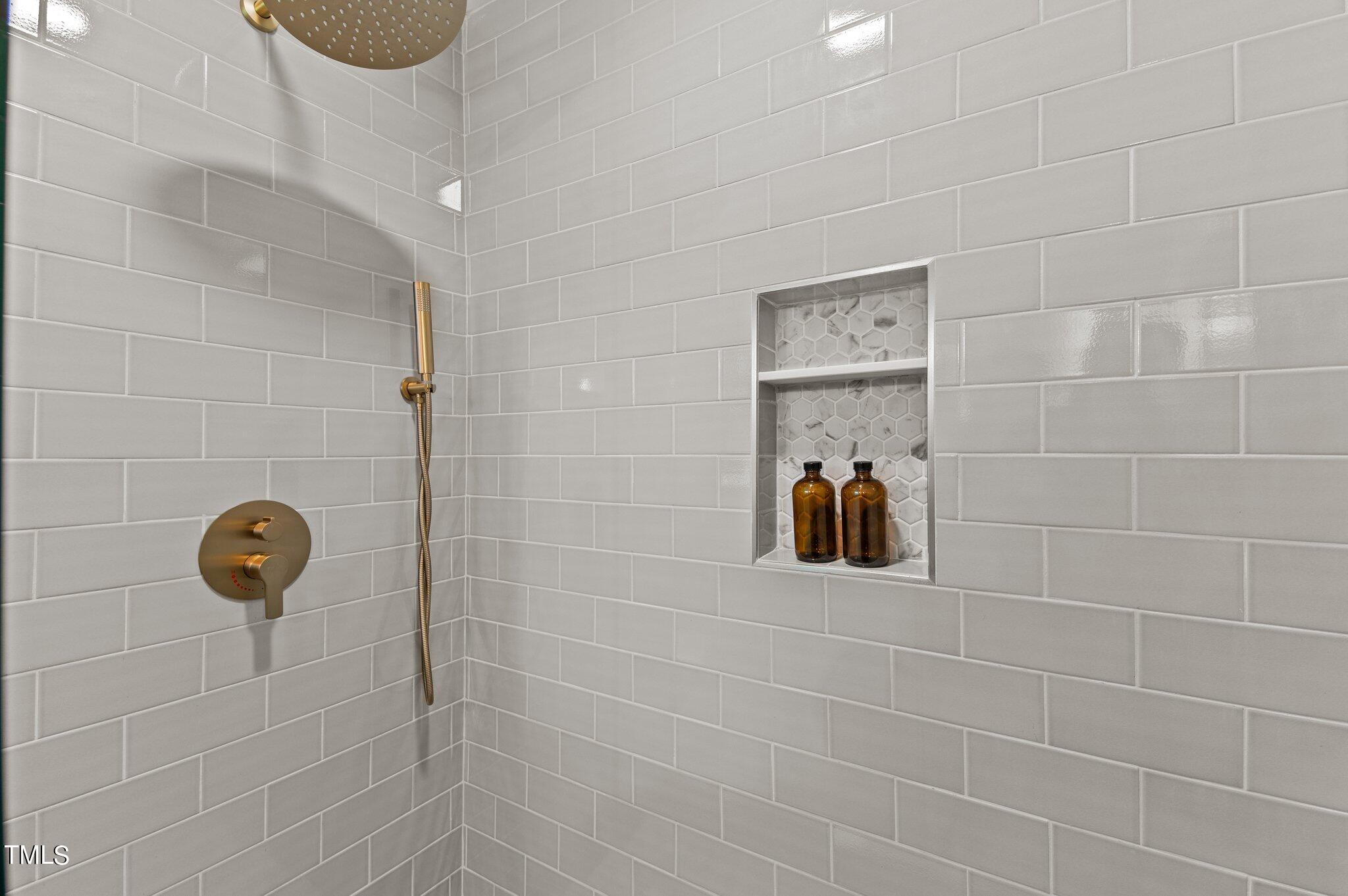 405 Roxanne Drive Raleigh, NC 27603 - Photo 34 of 48 a bathroom with a shower