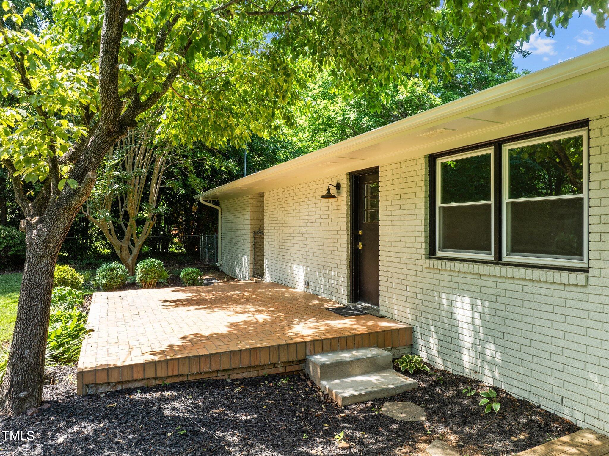 405 Roxanne Drive Raleigh, NC 27603 - Photo 39 of 48 a view of house with backyard