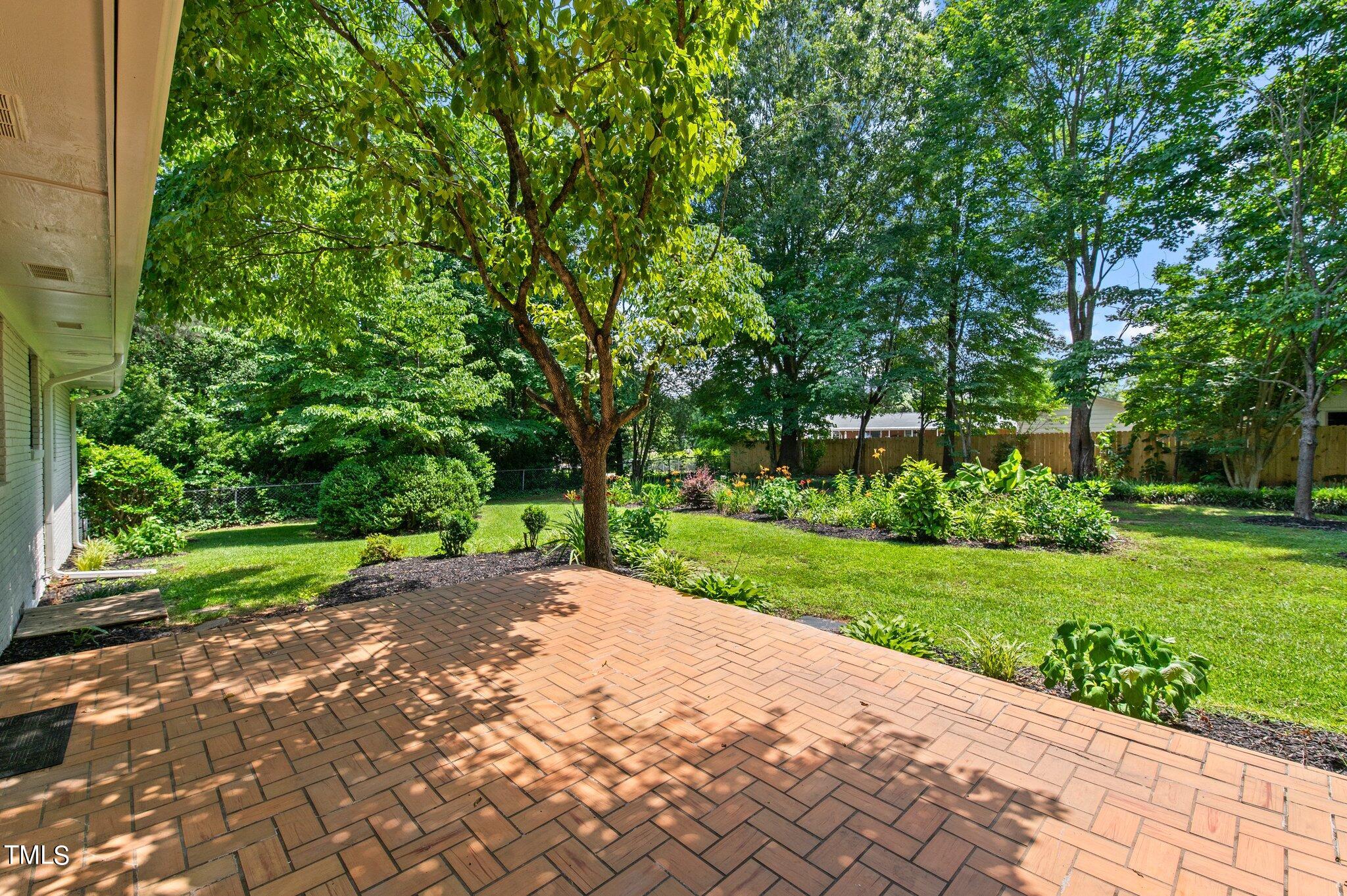 405 Roxanne Drive Raleigh, NC 27603 - Photo 41 of 48 a view of a park with plants and trees