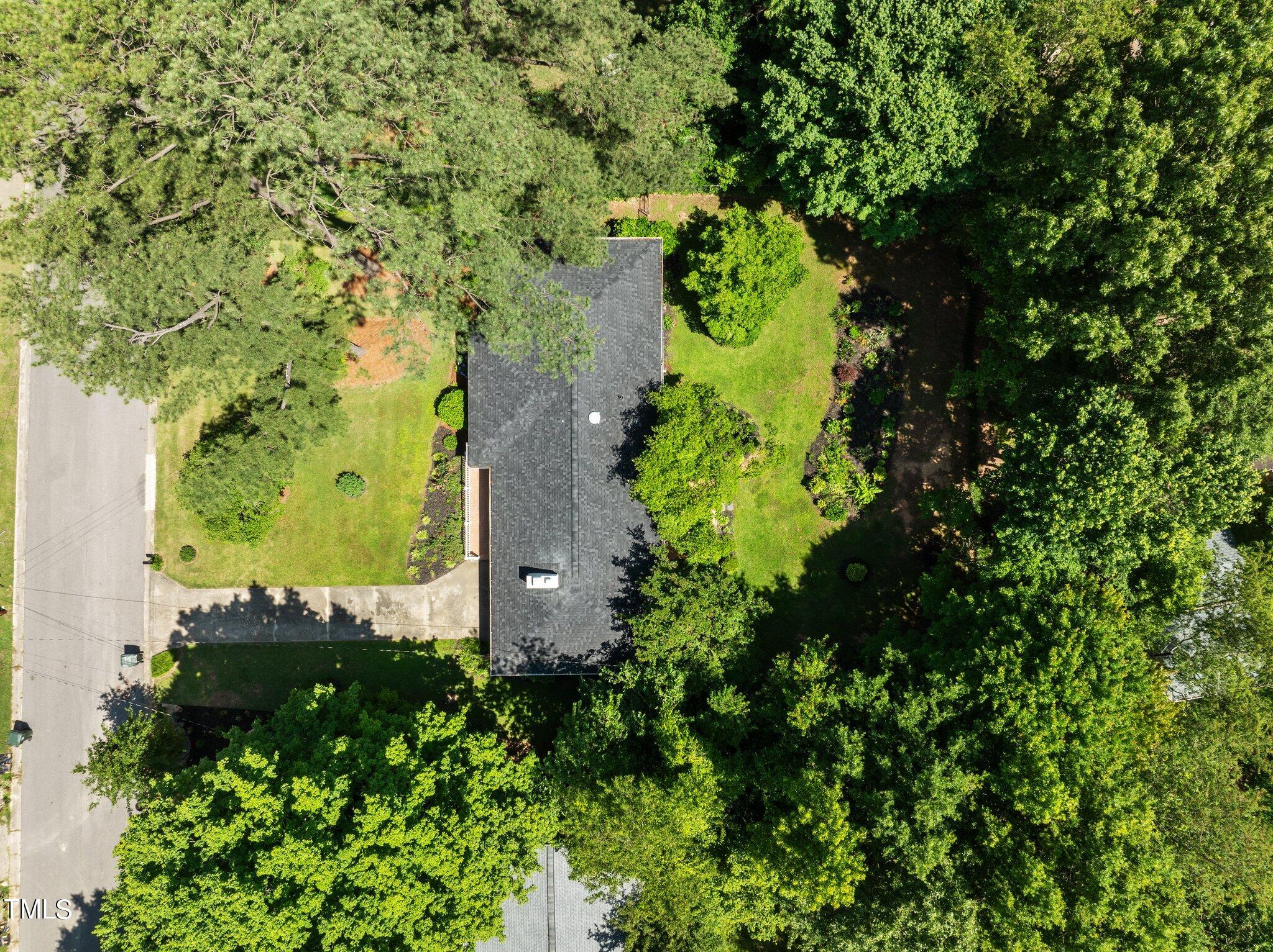 405 Roxanne Drive Raleigh, NC 27603 - Photo 45 of 48 an aerial view of a house with a yard