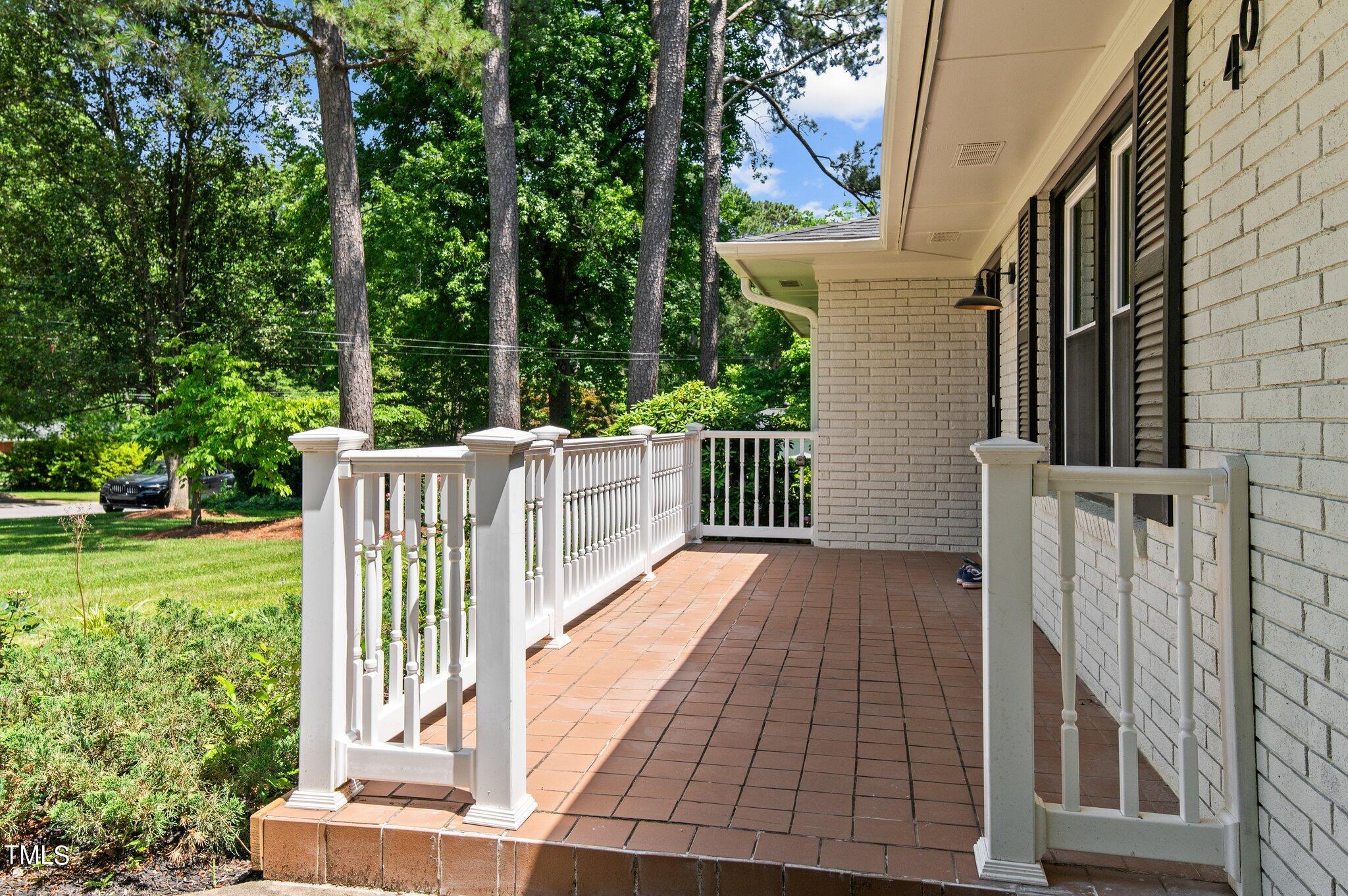 405 Roxanne Drive Raleigh, NC 27603 - Photo 6 of 48 a view of a house with backyard and porch