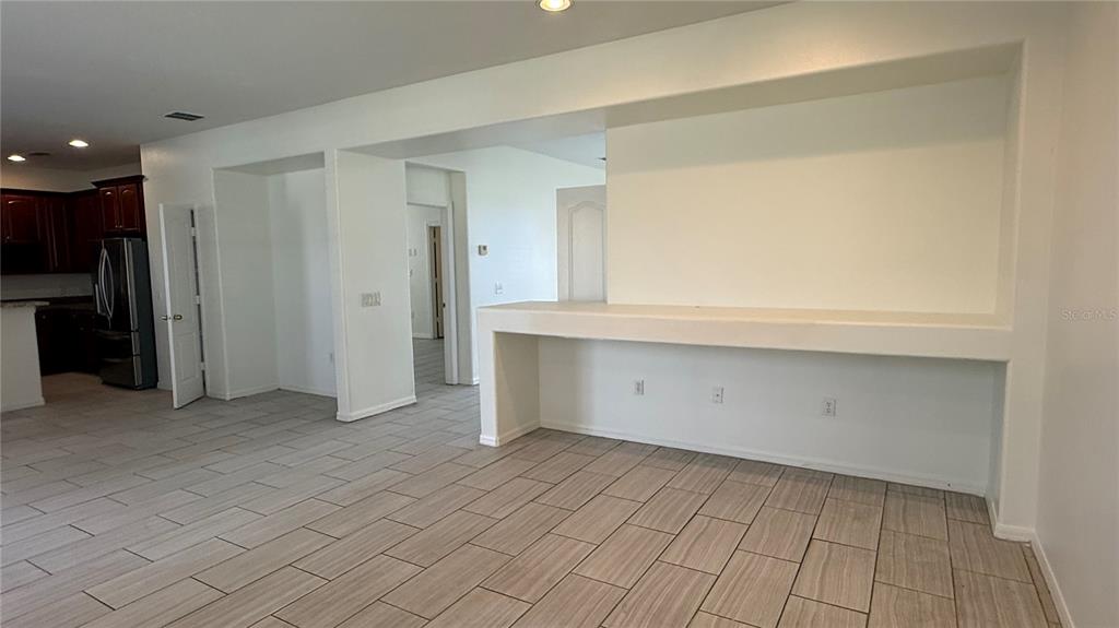 4484 Philadelphia Circle Kissimmee, FL 34746 - Photo 14 of 56 an empty room with a bathroom